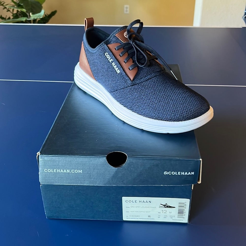 Brand new pair of COLE HAAN grand sport sneaker size 12!